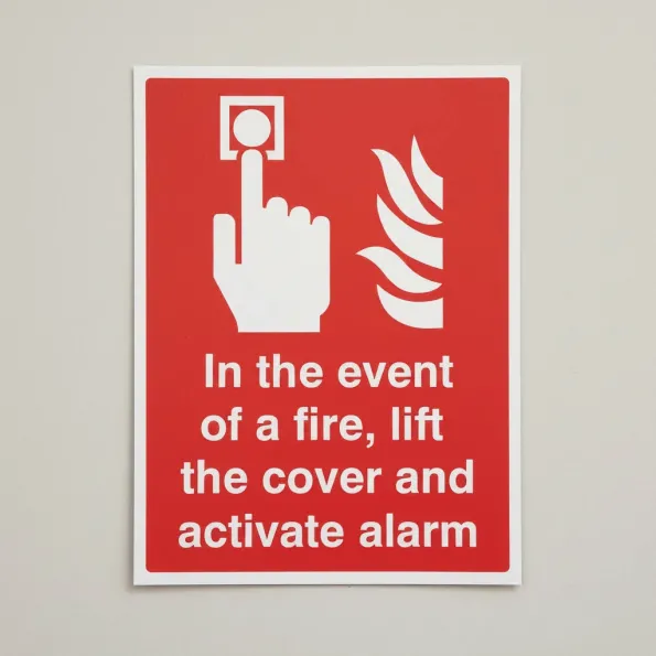 In the event of a Fire - Lift the Cover and Activate Alarm