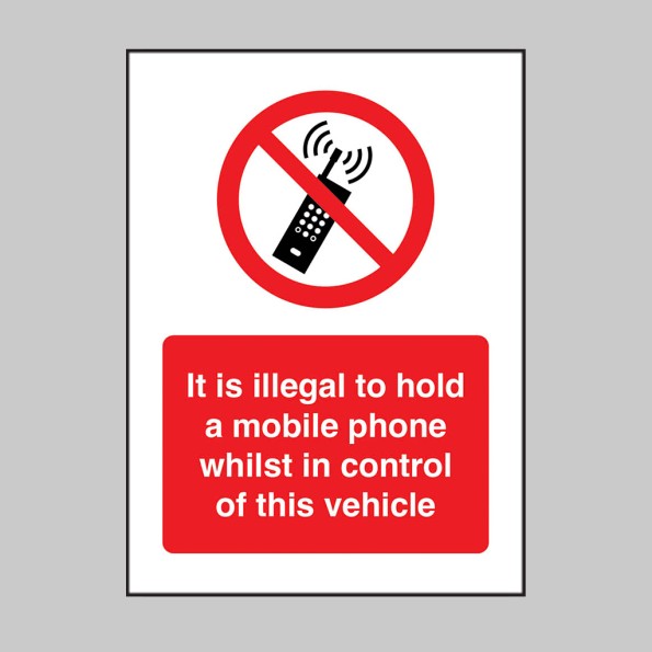 It is Illegal to Hold a Mobile Phone Whilst in Control of this Vehicle