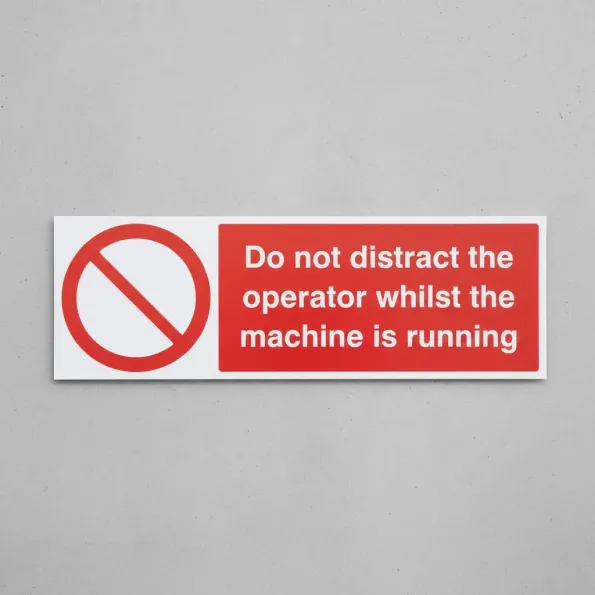 Do Not Distract the Operator Whilst Machine Is Running Do Not Distract the Operator Whilst Machine Is Running