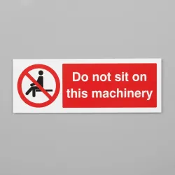 Do Not Sit On this Machinery Do Not Sit On this Machinery