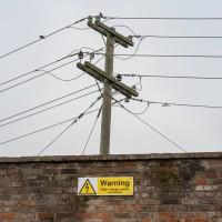 Warning - High Voltage Cables Overhead