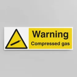 Warning - Compressed Gas Warning - Compressed Gas
