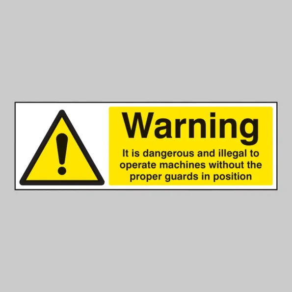 Warning - it Is Illegal to Operate Machines without Guards Warning - it Is Illegal to Operate Machines without Guards
