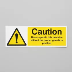 Caution - Never Operate Machine without Proper Guards