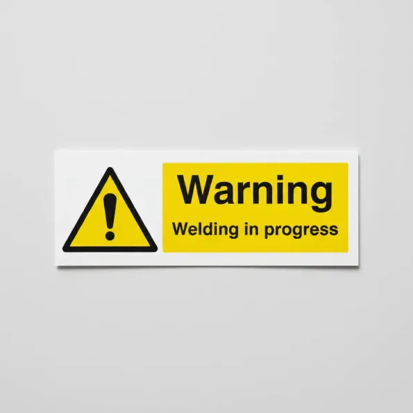 Warning - Welding in Progress Warning - Welding in Progress