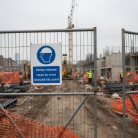 Safety Helmets Must be Worn Beyond this Point