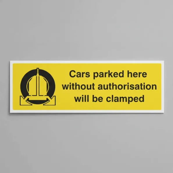 Cars Parked Here without Authorisation Will be Clamped