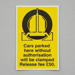 Cars Parked Here without Authorisation will be Clamped - Release Fee £50 Cars Parked Here without Authorisation will be Clamped - Release Fee £50