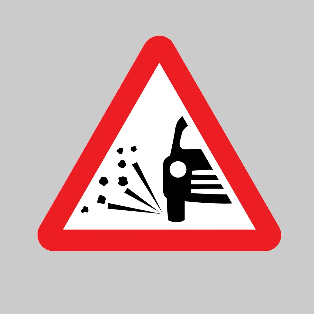Loose Chippings on Road Ahead symbol